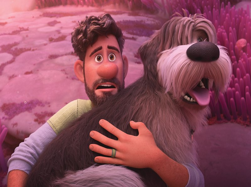 Searcher Clade (voiced by Jake Gyllenhaal) with his dog Legend in ‘Strange World.’